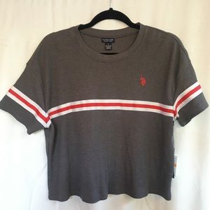 Gray with red and white stripe top.